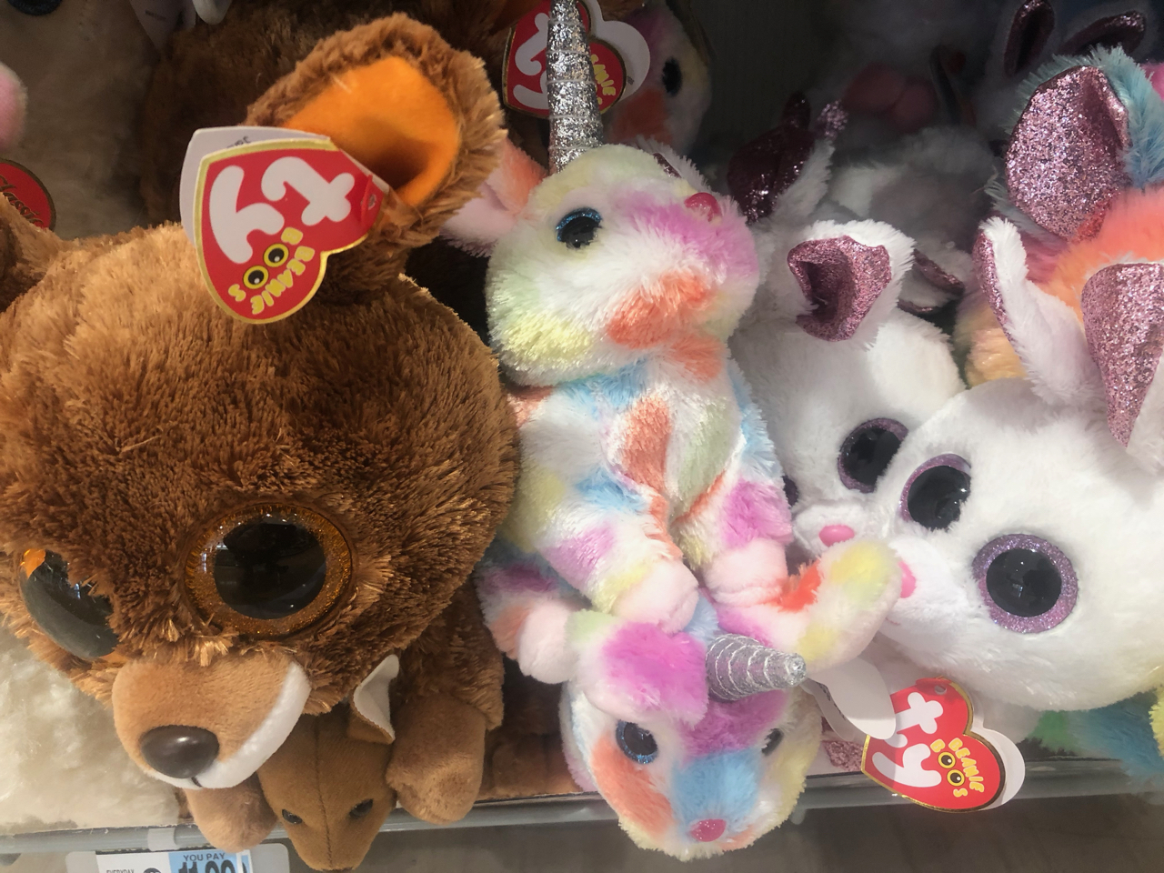 an orgy of Beanie Babies spills out of a store display
